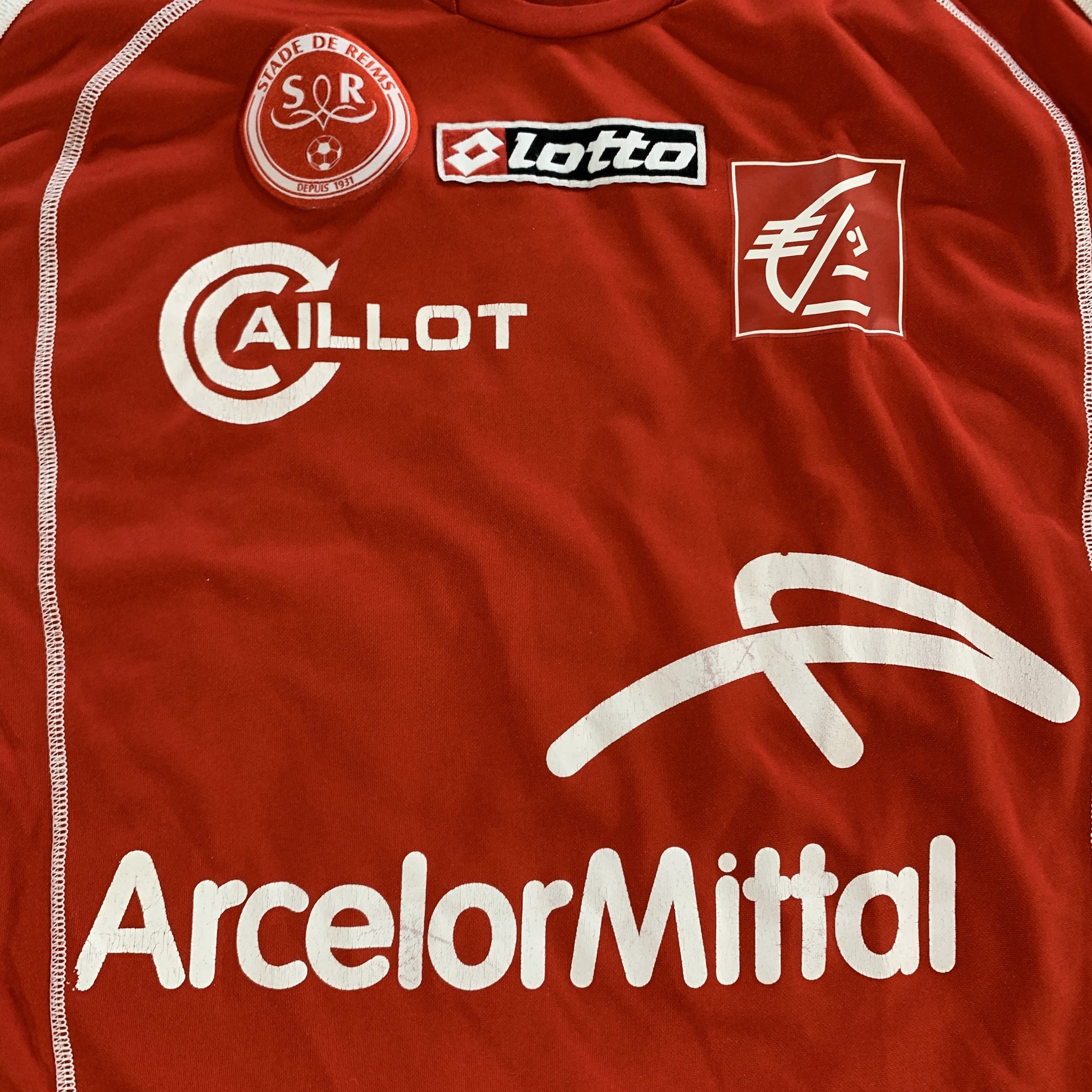 Détail face maillot domicile stade de reims gragnic vintage saison 2007-2008 arcelormittal lotto